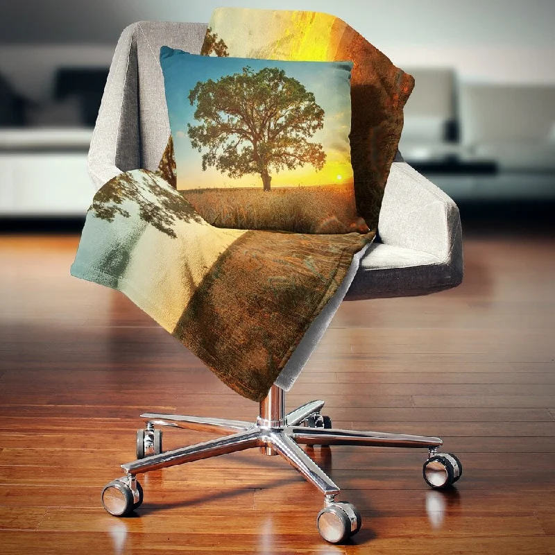Cotton blankets for breathability and a lightweight feelCotton blankets for breathability and a lightweight feelDesignart 'Big Green Tree in Summer Field' Trees Throw Blanket