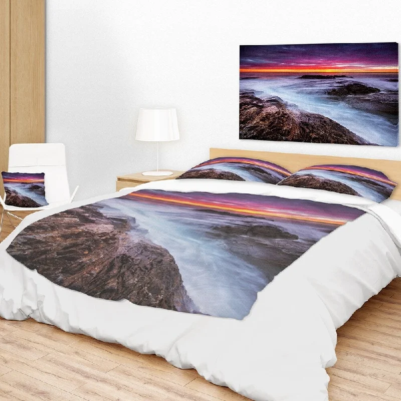 Recycled polyester blankets for an eco - conscious optionRecycled polyester blankets for an eco - conscious optionDesignart 'Stormy Seashore with Colorful Sky' Beach Photo Throw Blanket Recycled polyester blankets for an eco - conscious optionRecycled polyester blankets for an eco - conscious optionDesignart 'Stormy Seashore with Colorful Sky' Beach Photo Throw Blanket