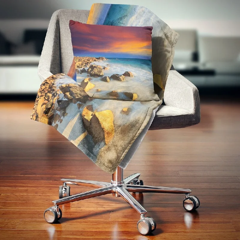 Cotton blankets for breathability and a lightweight feelCotton blankets for breathability and a lightweight feelDesignart 'Beach with Stones on Foreground' Seascape Throw Blanket