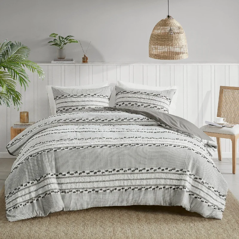 Microfiber - filled comforters that are lightweight and easy to care forINK+IVY Lennon Organic Cotton Jacquard Comforter Set