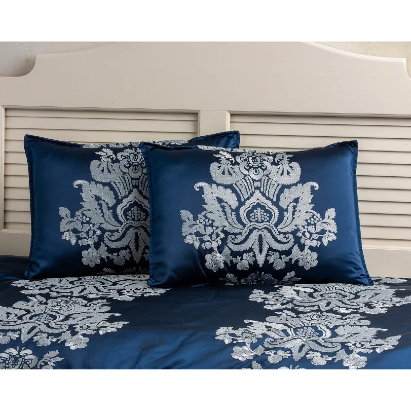 Goose down comforters known for their superior quality and insulationSussex deep blue comforter mini set with light blue damask medallion embroidery